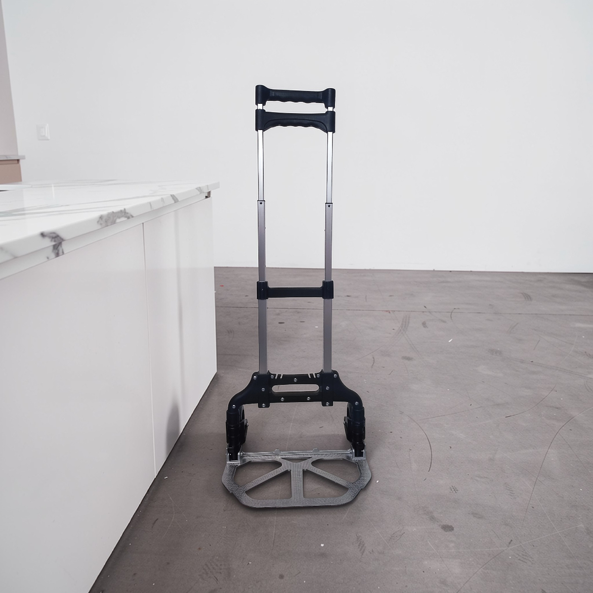 Location diable pliant/rétractable en alu, charge 70kg, 100cm